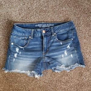 American Eagle distressed midi jean shorts